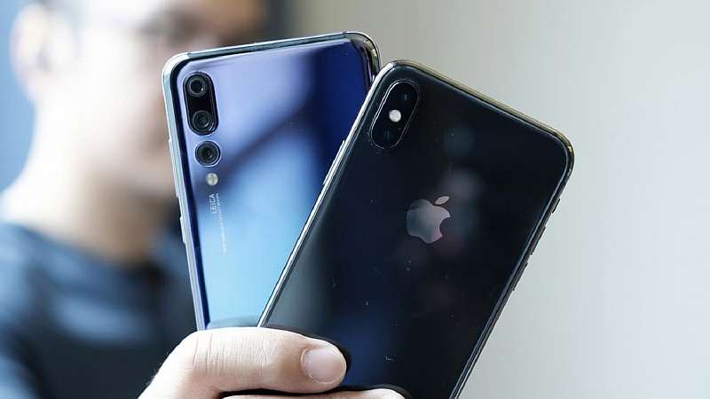 Китайских работяг увольняют за использование iPhone. Такого абсурда нет даже в России